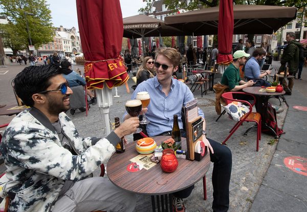 Guests Flock to Dutch Cafe Terraces as Lockdown Eases