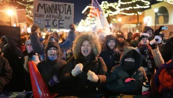 From Frigid Quiet to Outraged Sorrow, a Few Hours on Minneapolis Street Where Agents Killed Man